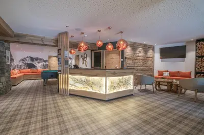Cuisine ou kitchenette dans l'établissement Chalet Hotel Yeti