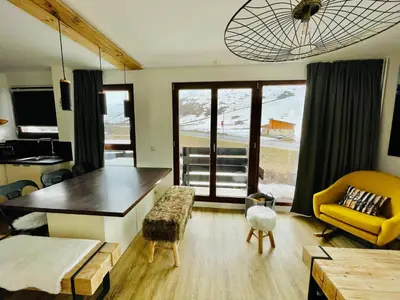 Coin salon dans l'établissement Moderne 3 pièces calme pour 4-5 personnes avec wifi à Tignes - FR-1-641-84