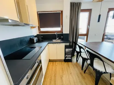 Cuisine ou kitchenette dans l'établissement Moderne 3 pièces calme pour 4-5 personnes avec wifi à Tignes - FR-1-641-84