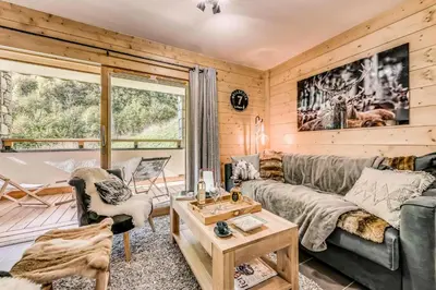 Coin salon dans l'établissement Résidence Les Balcons EtoilÉs - Appartement 4 au pied des pistes MAE-4224
