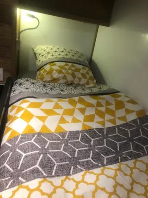 Un ou plusieurs lits dans un hébergement de l'établissement Magnifique petit studio 2-3 personnes dans l'Hyper Centre skis aux pieds vue front de neige