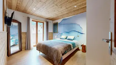 Un ou plusieurs lits dans un hébergement de l'établissement Chalet Grand Croix - Haut Standing 10 pers