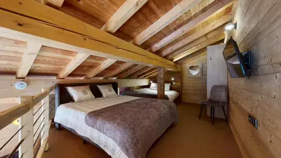 Un ou plusieurs lits dans un hébergement de l'établissement Chalet Grand Croix - Haut Standing 10 pers