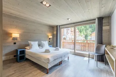 Un ou plusieurs lits dans un hébergement de l'établissement Victoria Lodge, Friendly Hotel