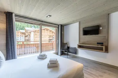 Un ou plusieurs lits dans un hébergement de l'établissement Victoria Lodge, Friendly Hotel