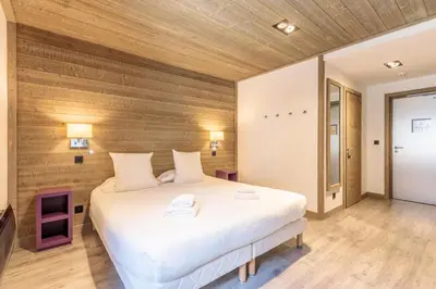 Un ou plusieurs lits dans un hébergement de l'établissement Victoria Lodge, Friendly Hotel