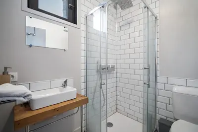Salle de bains dans l'établissement CHALET AUBERGE - Les Mélèzes