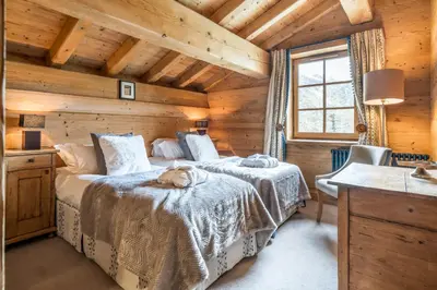 Un ou plusieurs lits dans un hébergement de l'établissement Madame Vacances Chalet Davos