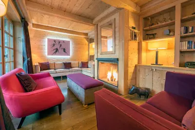 Coin salon dans l'établissement Madame Vacances Chalet Davos