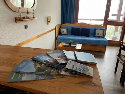 Coin salon dans l'établissement Le choucas - Les Arcs