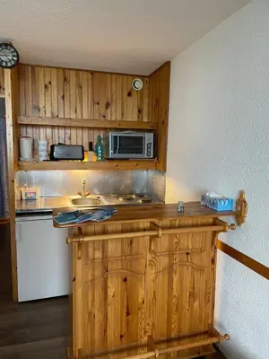 Cuisine ou kitchenette dans l'établissement Le choucas - Les Arcs