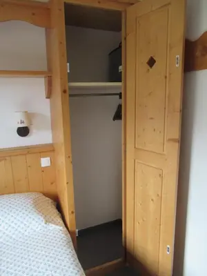 Un ou plusieurs lits dans un hébergement de l'établissement Résidence Les Alpages 4 étoiles - Appartement 4 personnes - Piscine, Hammam, Sauna, Jacuzzi - ValCenis 73480