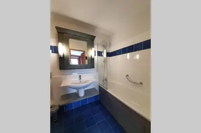 Salle de bains dans l'établissement Arc 1950 Résidence 5* Sources de Marie 4/6 pers