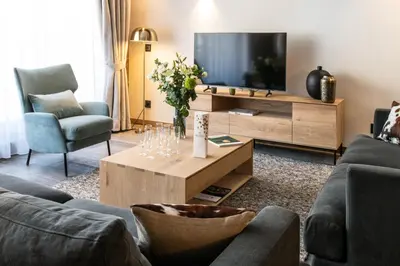 Télévision ou salle de divertissement dans l'établissement Alaska Lodge by Alpine Resorts
