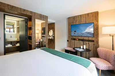 Un ou plusieurs lits dans un hébergement de l'établissement Hotel Tetras Lodge