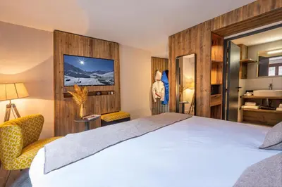 Un ou plusieurs lits dans un hébergement de l'établissement Hotel Tetras Lodge