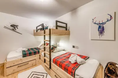 Un ou plusieurs lits dans un hébergement de l'établissement Résidence Les Nouveaux Alpages - Appartement 4 avec accès au SPA inclus MAE-8234