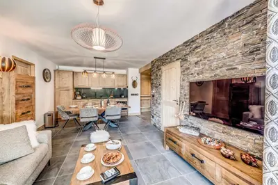 Coin salon dans l'établissement Résidence Les Nouveaux Alpages - Appartement 4 avec accès au SPA inclus MAE-8234