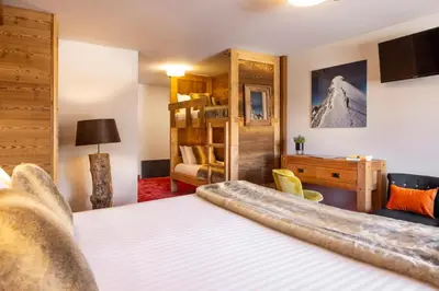 Un ou plusieurs lits dans un hébergement de l'établissement Hôtel Ski Lodge - Chambres & Appartements - Village Montana