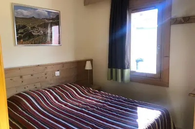 Un ou plusieurs lits dans un hébergement de l'établissement Les Cristaux de La Plagne - BELLE PLAGNE 7 PERS