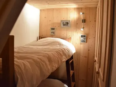 Un ou plusieurs lits dans un hébergement de l'établissement Appartement en centre-ville, proche des pistes, 4 personnes - FR-1-464-191