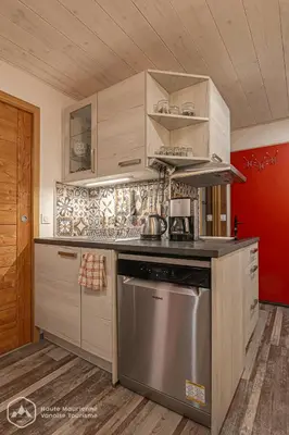 Cuisine ou kitchenette dans l'établissement Le Cocon de l'Arcelle