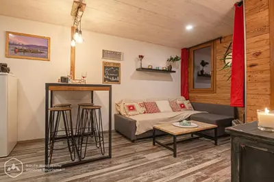 Coin salon dans l'établissement Le Cocon de l'Arcelle