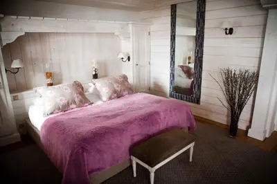 Un ou plusieurs lits dans un hébergement de l'établissement Hôtel Les Barmes De l'Ours