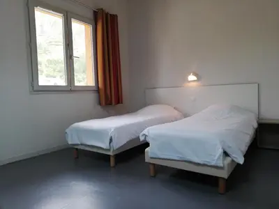 Un ou plusieurs lits dans un hébergement de l'établissement Village vacances de Val d'Isère