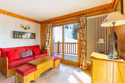 Coin salon dans l'établissement Résidence Le Roselend - maeva Home