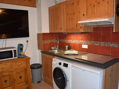 Cuisine ou kitchenette dans l'établissement Studio/mezzanine confortable près de la patinoire - FR-1-464-192