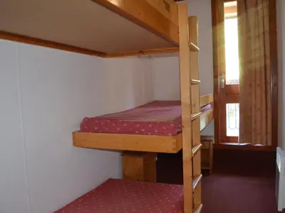Un ou plusieurs lits dans un hébergement de l'établissement Appartement 3 pièces pour 7 pers., animaux admis, Arc 1800 - FR-1-411-698