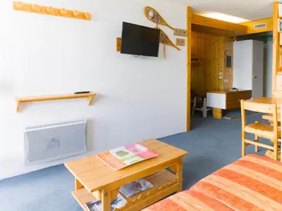 Télévision ou salle de divertissement dans l'établissement Appartement 2 pièces pour 6 pers. aux Arcs 1800, balcon exposé Ouest - FR-1-411-720