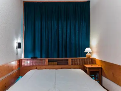 Un ou plusieurs lits dans un hébergement de l'établissement Appartement 2 pièces 6 pers. au cœur des Arcs 1800 avec Wifi - FR-1-411-712