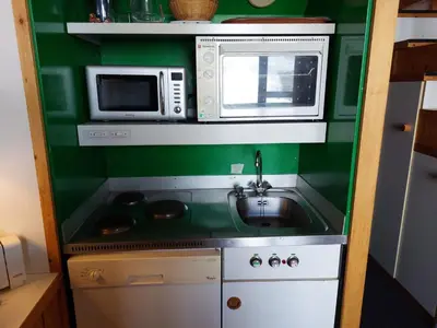 Cuisine ou kitchenette dans l'établissement Duplex 6 pers. avec Wifi et animaux admis, vue Mont-Blanc - FR-1-411-731
