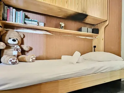 Un ou plusieurs lits dans un hébergement de l'établissement Appartement 2 pièces, 4 personnes, proche pistes, animaux acceptés - FR-1-411-775