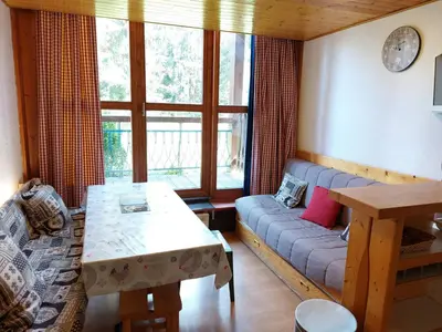 Coin salon dans l'établissement Duplex 6 pers à Arc 1800 avec Wifi, proche pistes - FR-1-411-798