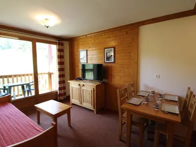Télévision ou salle de divertissement dans l'établissement Appartement 4 pers. pied des pistes avec piscine et parking, Lanslebourg-Val Cenis - FR-1-508-251