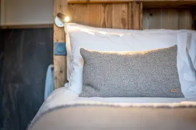 Un ou plusieurs lits dans un hébergement de l'établissement Madame Vacances Chalet Inuit