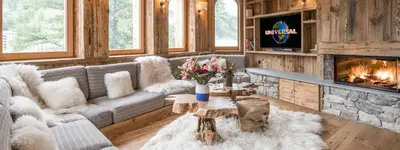 Télévision ou salle de divertissement dans l'établissement Madame Vacances Chalet Inuit