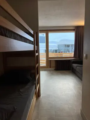 Un ou plusieurs lits dans un hébergement de l'établissement MyHome - Génépis 9 - Studio rénové Tignes Val Claret 4 pax sks aux pieds