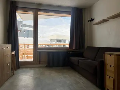 Coin salon dans l'établissement MyHome - Génépis 9 - Studio rénové Tignes Val Claret 4 pax sks aux pieds