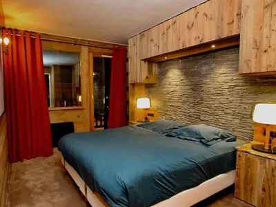Un ou plusieurs lits dans un hébergement de l'établissement Appartement central Val d'Isère, ski aux pieds, 2 chambres, Wifi - FR-1-519-31