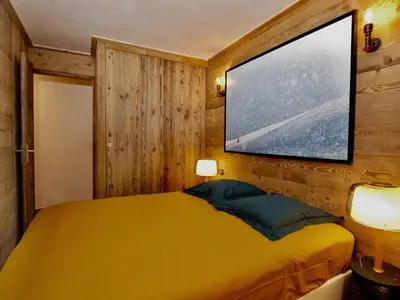 Un ou plusieurs lits dans un hébergement de l'établissement Appartement central Val d'Isère, ski aux pieds, 2 chambres, Wifi - FR-1-519-31