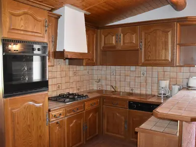 Cuisine ou kitchenette dans l'établissement Duplex spacieux 6 pers près des pistes - FR-1-464-194