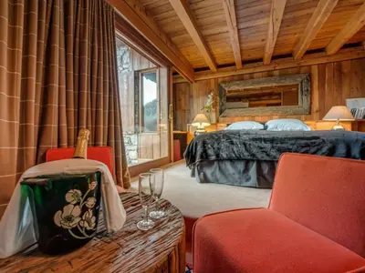 Un ou plusieurs lits dans un hébergement de l'établissement Chalet de luxe 5 chambres, non fumeur, parking inclus - FR-1-519-32