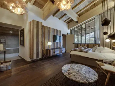 Un ou plusieurs lits dans un hébergement de l'établissement Appartement de luxe 5 chambres avec spa à Tignes - FR-1-641-1