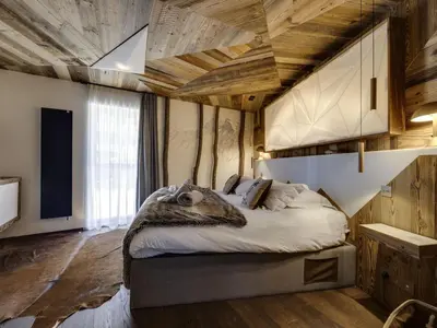 Un ou plusieurs lits dans un hébergement de l'établissement Appartement de luxe 5 chambres avec spa à Tignes - FR-1-641-1