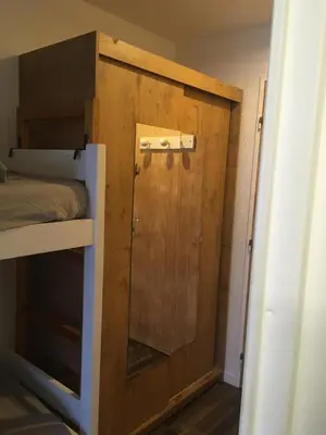 Un ou plusieurs lits dans un hébergement de l'établissement Studio 1 cabine chalet club III refait à neuf