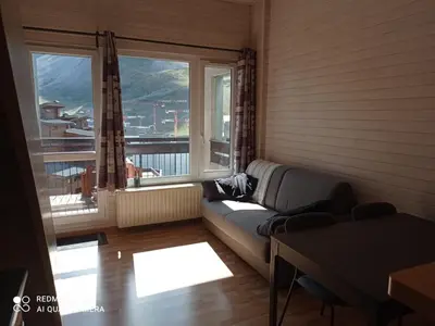 Coin salon dans l'établissement Studio lumineux 2 pièces avec mezzanine au Val-Claret, Tignes - FR-1-449-184
